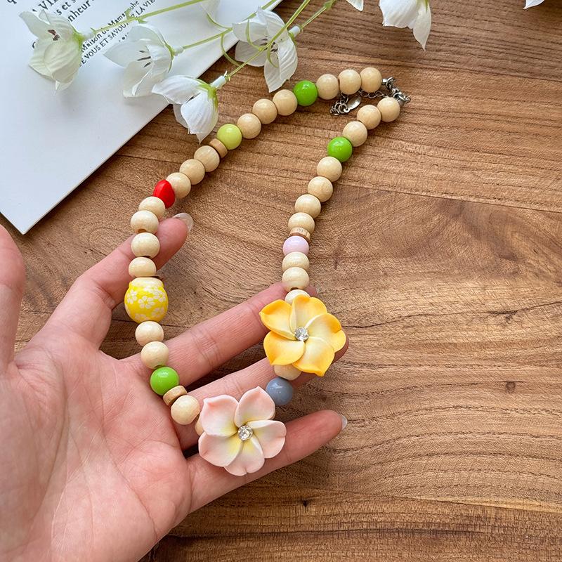 Acrylic dopamine wood beads flower necklace vacation wind sweet collarbone chain fashion personality temperament jewelry
Acrylic dopamine wood beads flower necklace vacation wind sweet collarbone chain fashion personality temperament jewelry
