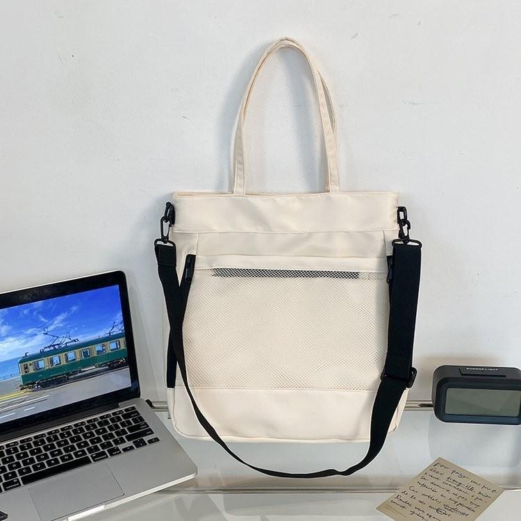 Универсальная нейлоновая сумка-тоут унисекс на молнии для путешествий в классических цветах
Универсальная нейлоновая сумка-тоут унисекс на молнии для путешествий в классических цветах