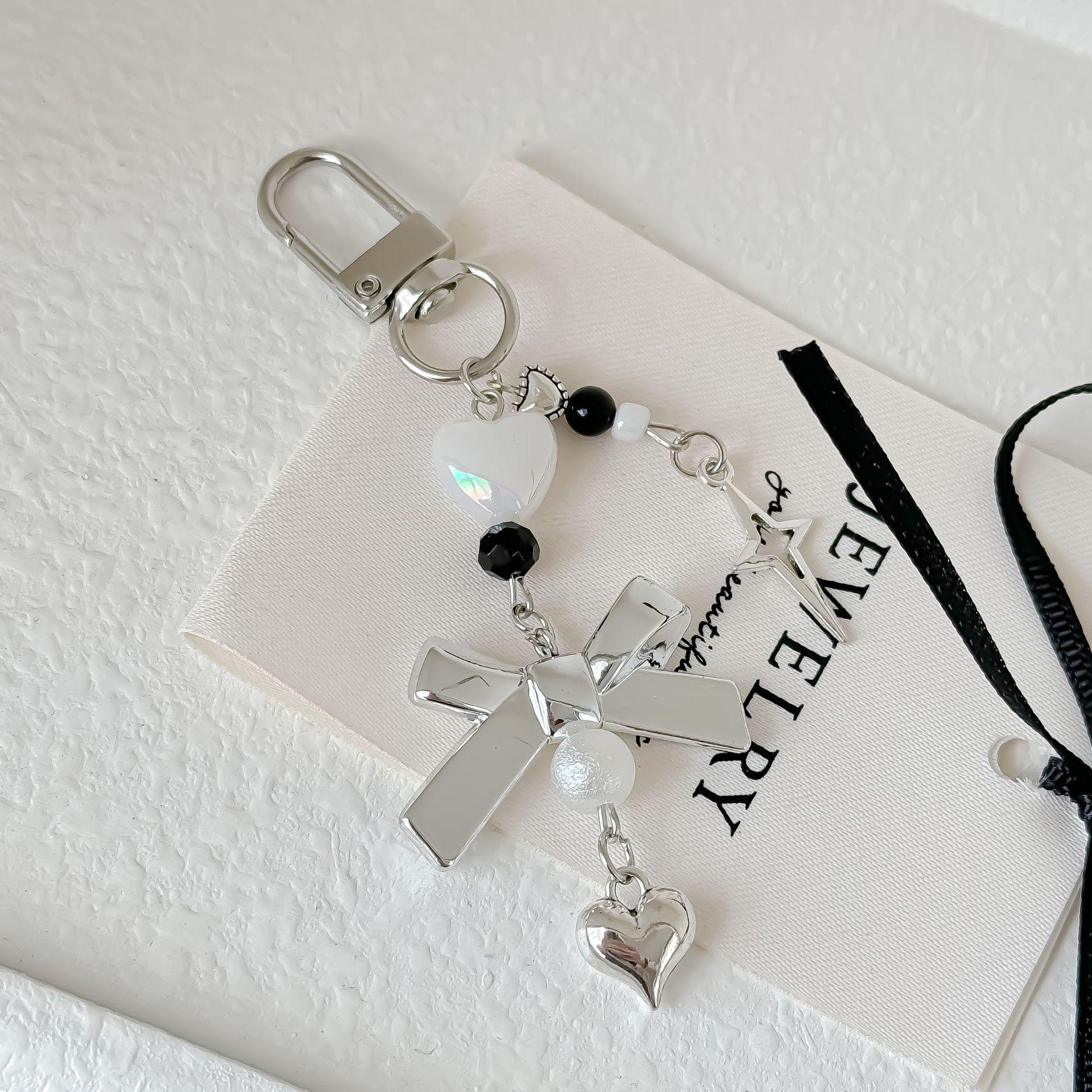 Стильный серебряный телефонный брелок-бантик с универсальными подвесками в виде карты Polaroid и сумки Love Bag
Стильный серебряный телефонный брелок-бантик с универсальными подвесками в виде карты Polaroid и сумки Love Bag