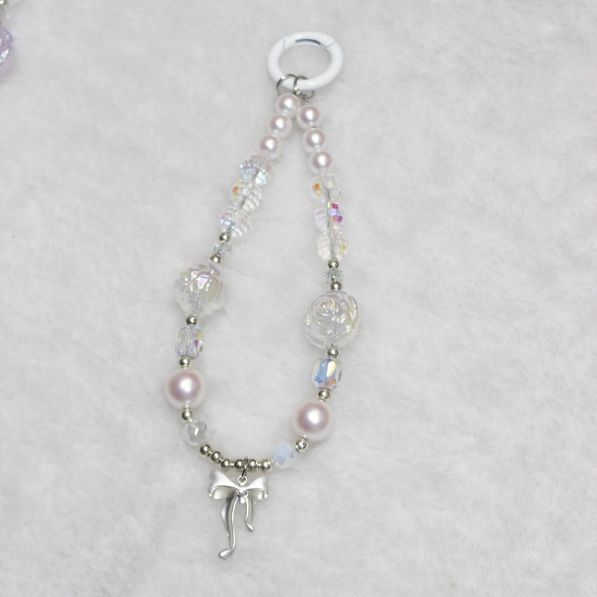 Ремінець на руку для телефону Короткий 26 см Квіткові акценти з бантом Намисто Ремінець-браслет для телефону Silver
Ремінець на руку для телефону Короткий 26 см Квіткові акценти з бантом Намисто Ремінець-браслет для телефону Silver