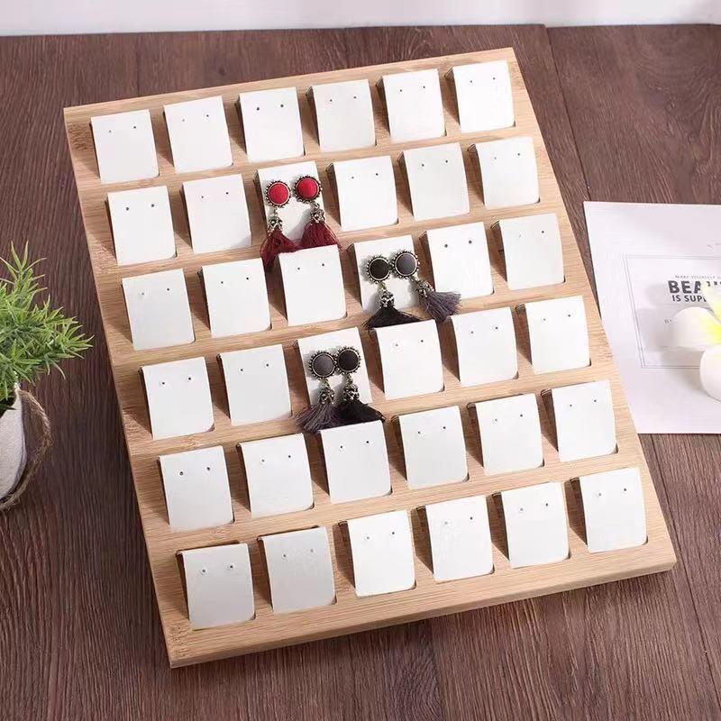 Bamboo & Wood 36-Slot Movable Earring and Stud Display Tray; Jewelry Accessories Shelf
Bamboo & Wood 36-Slot Movable Earring and Stud Display Tray; Jewelry Accessories Shelf