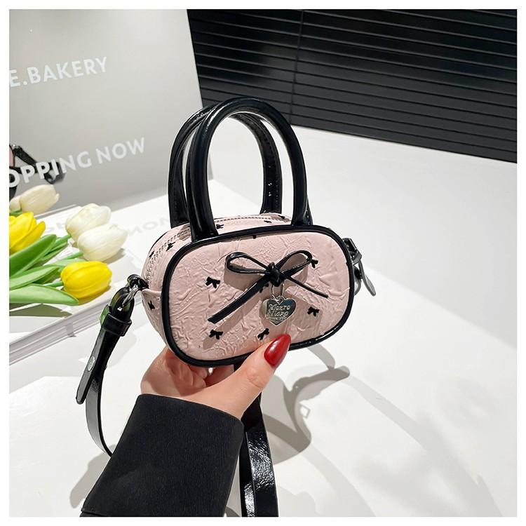 Pink bow portable pillow bag women s bag new high-end ballet messenger bag рожевий
Pink bow portable pillow bag women s bag new high-end ballet messenger bag рожевий