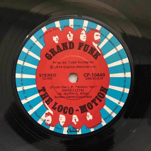 7inch Record GRAND FUNK RAILROAD - The Loco-Motion S4591073 Capitol Records 1974 Australia Rock Used
7inch Record GRAND FUNK RAILROAD - The Loco-Motion S4591073 Capitol Records 1974 Australia Rock Used