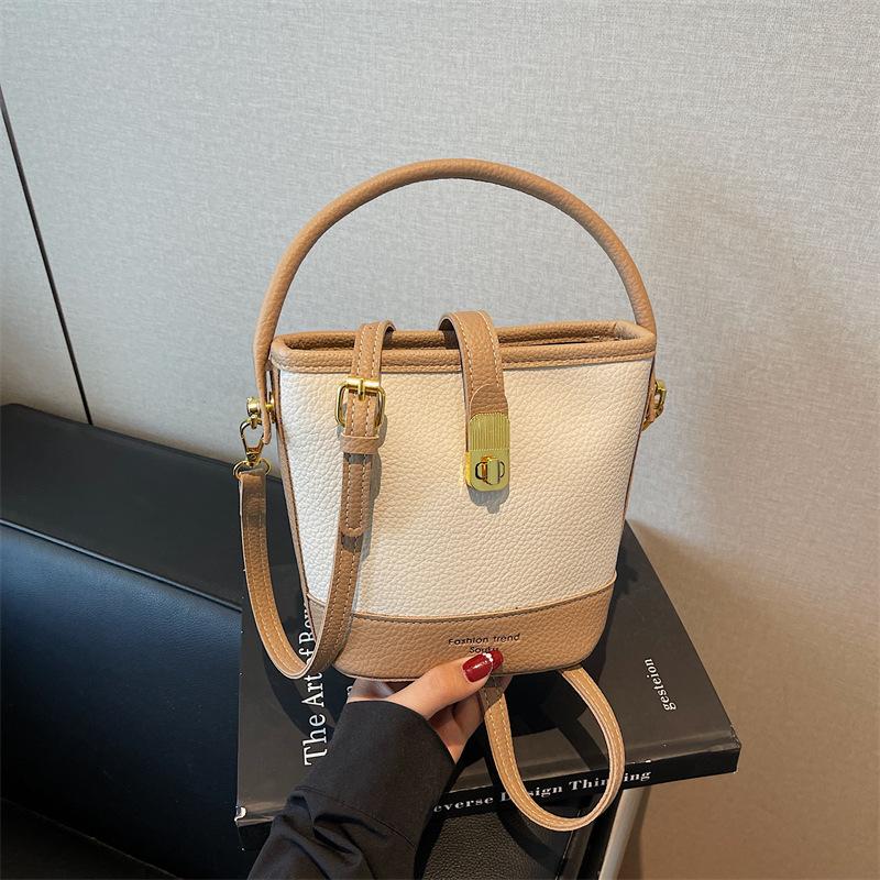 Niche portable bucket bag women s new spring and summer versatile shoulder bag commuter messenger bag хаки
Niche portable bucket bag women s new spring and summer versatile shoulder bag commuter messenger bag хаки