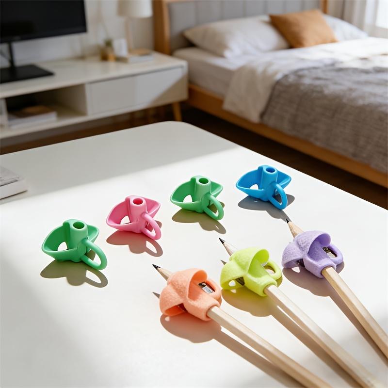 Ergonomic Correction Pen Grip Device Silicone Pencil Grip Posture Trainer Home School Office Writing Auxiliary Stationery
Ergonomic Correction Pen Grip Device Silicone Pencil Grip Posture Trainer Home School Office Writing Auxiliary Stationery