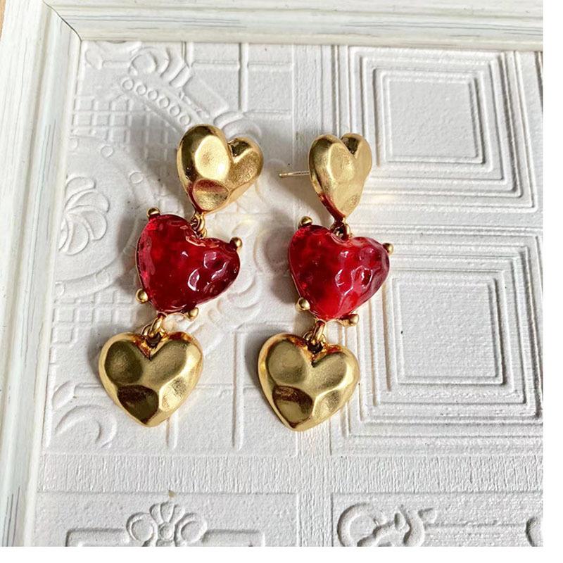 The Heart of Family medieval vintage plain gold irregular long love glazed earrings, hand-burned lava series
The Heart of Family medieval vintage plain gold irregular long love glazed earrings, hand-burned lava series