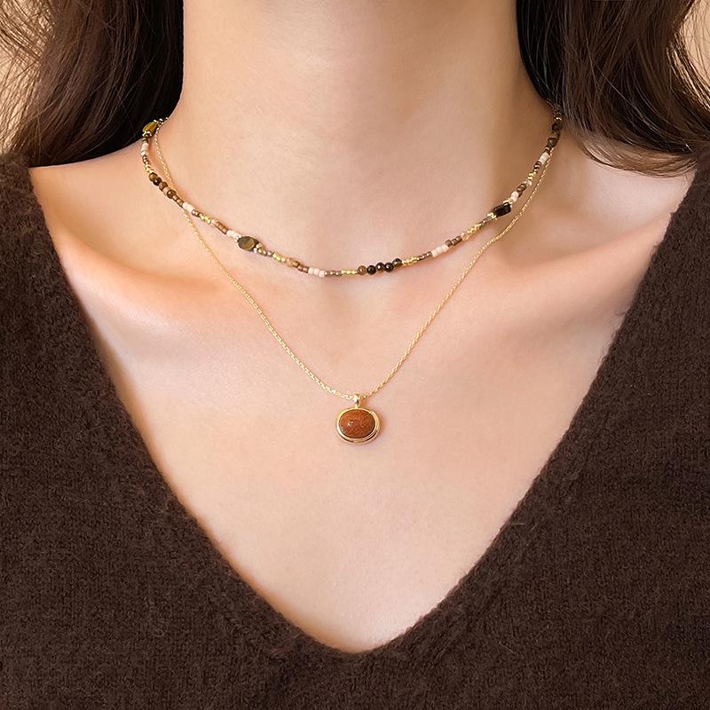 Ретро намисто з тигрового ока - Коричневий круглий кулон для осінньо-зимової моди, Жіночий елегантний ланцюжок для светра у французькому стилі
Ретро намисто з тигрового ока - Коричневий круглий кулон для осінньо-зимової моди, Жіночий елегантний ланцюжок для светра у французькому стилі