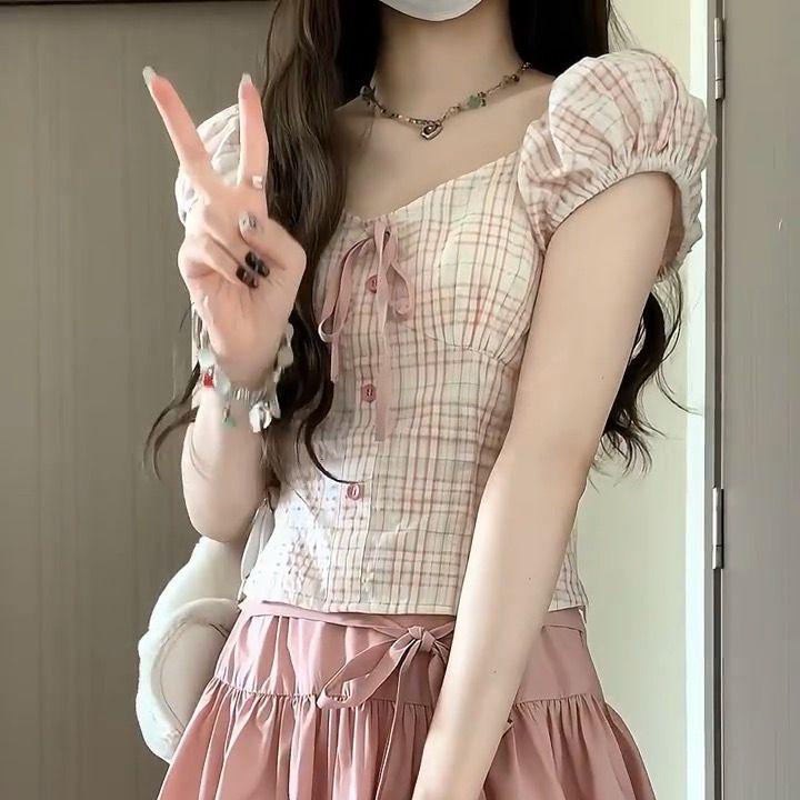 Korean Summer Style: Sweet & Spicy Puff Sleeve Top with Waist-Cinching Slim Bow Skirt for Women S
Korean Summer Style: Sweet & Spicy Puff Sleeve Top with Waist-Cinching Slim Bow Skirt for Women S