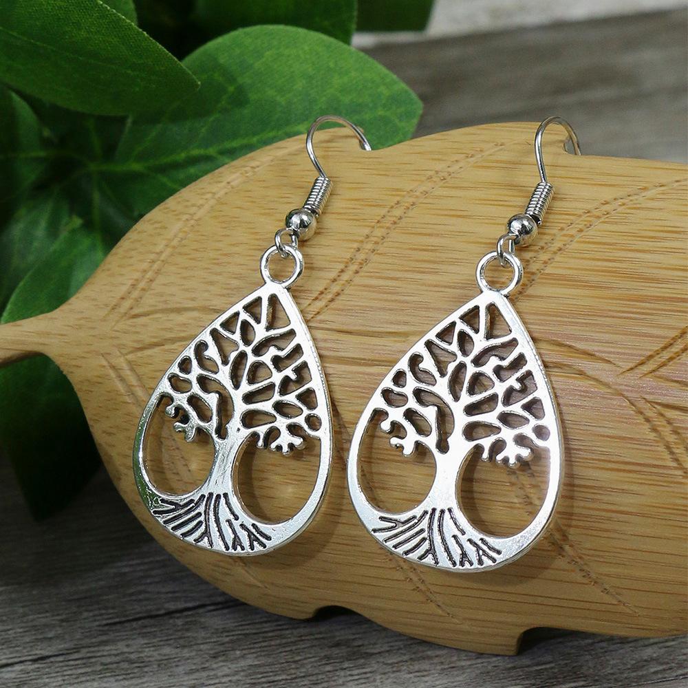 Ethnic Tree Of Life Earrings Vintage Silver Color Round Hollow Jewelry Earrings Women s Classic Simple Ear Rings Wedding Party
Ethnic Tree Of Life Earrings Vintage Silver Color Round Hollow Jewelry Earrings Women s Classic Simple Ear Rings Wedding Party