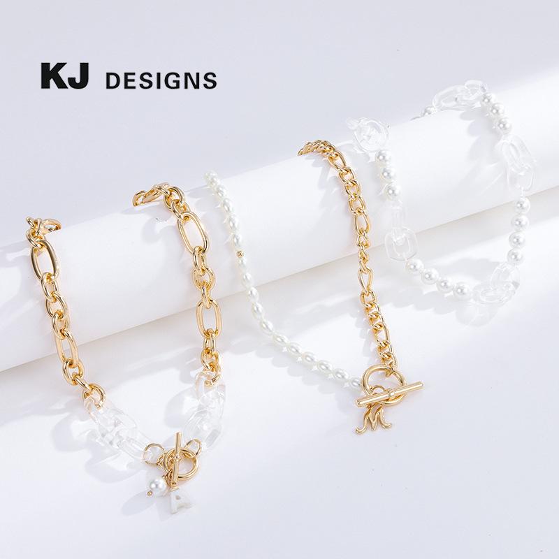 Kenjie Transparent Resin Pearl Necklace with Versatile OT Clasp and Letter Pendant for Women.
Kenjie Transparent Resin Pearl Necklace with Versatile OT Clasp and Letter Pendant for Women.
