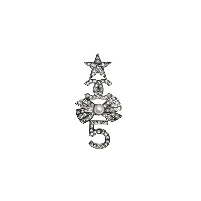 CHANEL metal, glass and rhinestone star double C number 5 silver brooch срібний
CHANEL metal, glass and rhinestone star double C number 5 silver brooch срібний