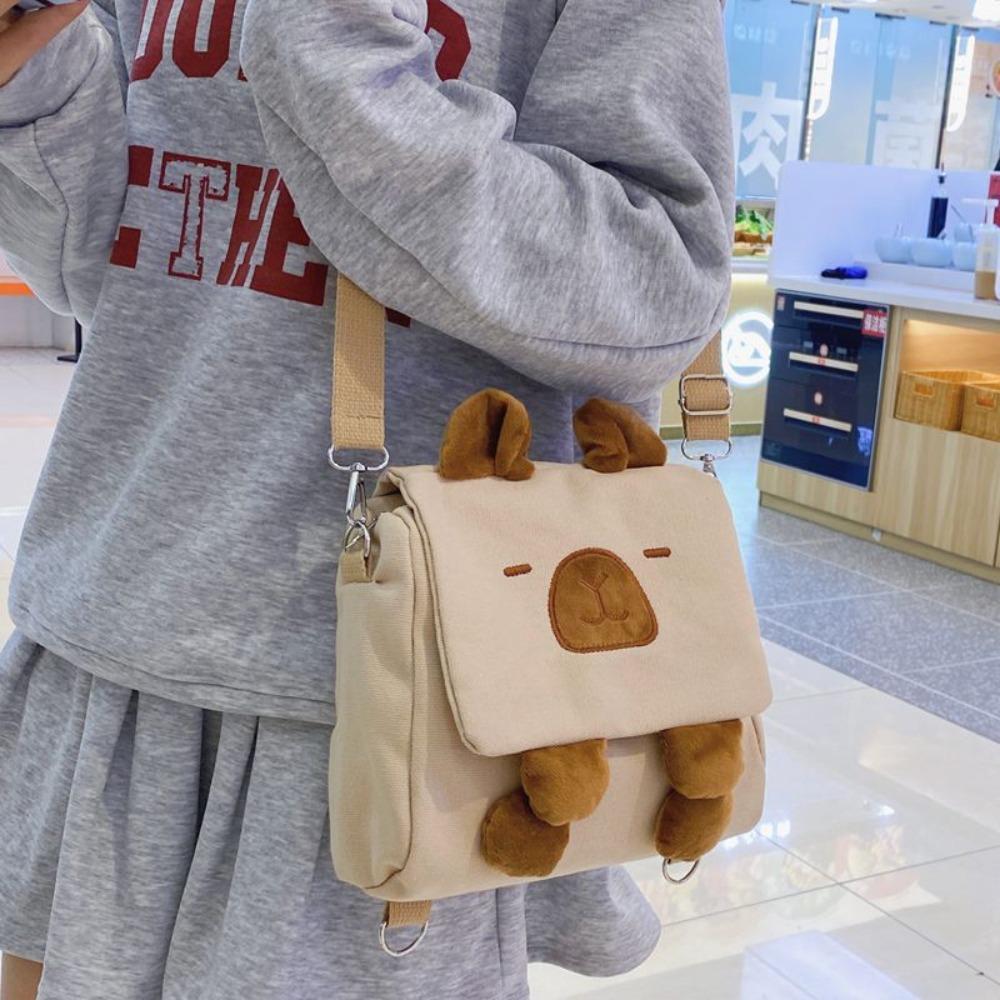 Мультяшный плюшевый рюкзак Capybara, многофункциональная плюшевая сумка в виде морской свинки, модная сумка через плечо
Мультяшный плюшевый рюкзак Capybara, многофункциональная плюшевая сумка в виде морской свинки, модная сумка через плечо