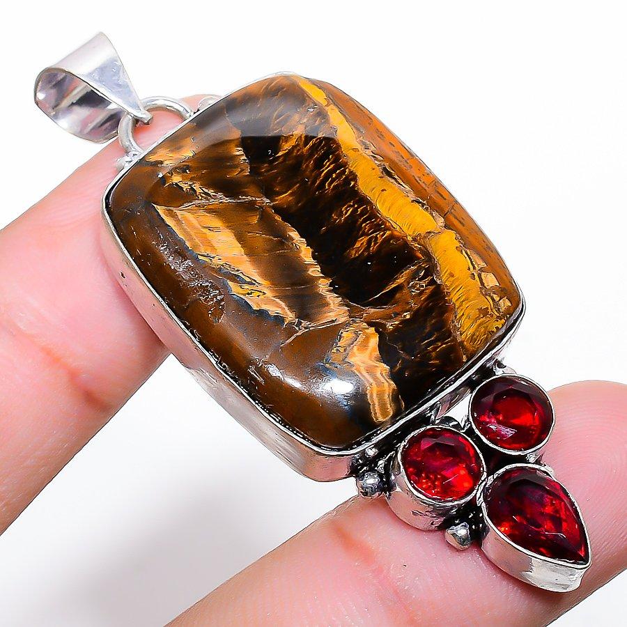 Этническая ювелирная подвеска ручной работы с тигровым глазом и драгоценным камнем 2,29 дюйма SR-4679
Этническая ювелирная подвеска ручной работы с тигровым глазом и драгоценным камнем 2,29 дюйма SR-4679