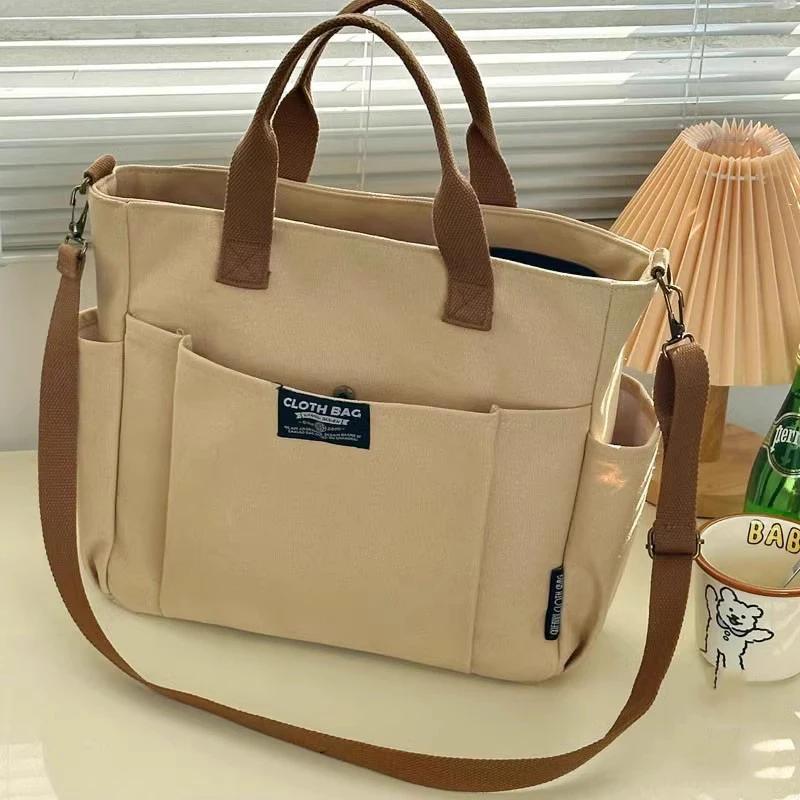 Urban Minimalist Female Student Large Capacity Commuting Horizontal Canvas Single Shoulder Diagonal Cross Portable Tote Bag
Urban Minimalist Female Student Large Capacity Commuting Horizontal Canvas Single Shoulder Diagonal Cross Portable Tote Bag
