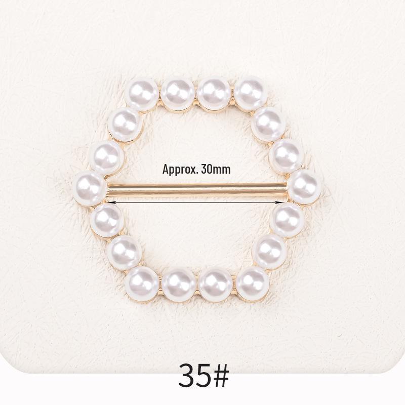 Летняя корейская футболка премиум-класса с металлической пряжкой и круглым узлом с жемчугом
Летняя корейская футболка премиум-класса с металлической пряжкой и круглым узлом с жемчугом