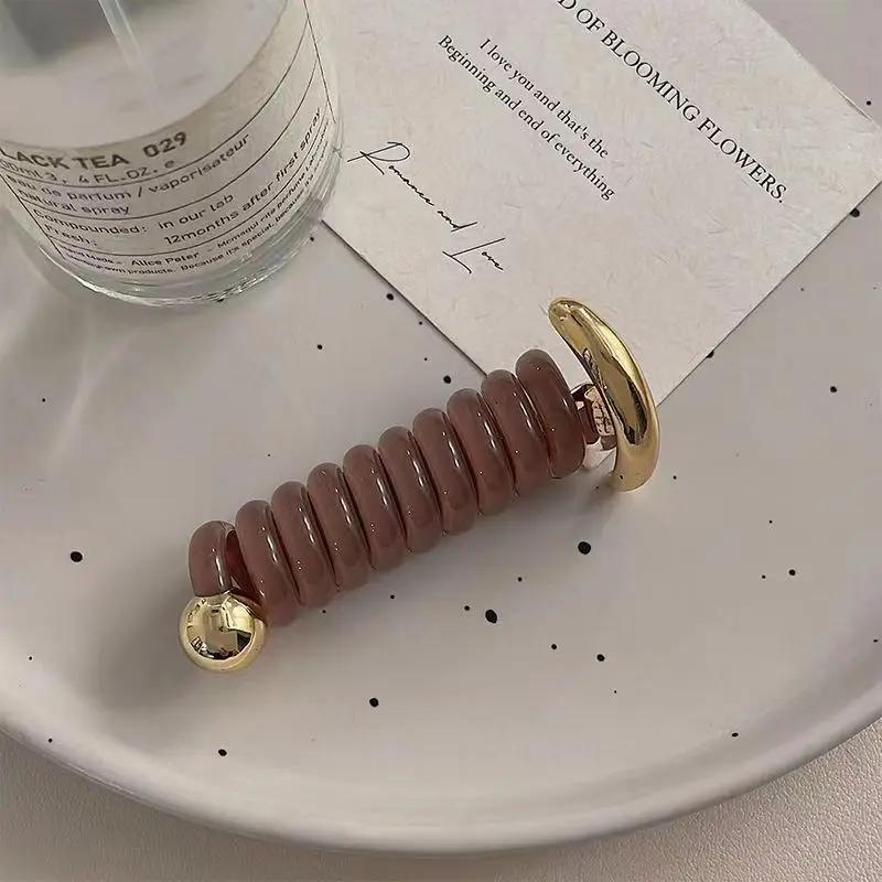 Модный стиль спиральная резинка для волос металлические резинки для волос из термопластичного полиуретана для девочек и женщин аксессуары для волос эластичные резинки для волос в японском стиле
Модный стиль спиральная резинка для волос металлические резинки для волос из термопластичного полиуретана для девочек и женщин аксессуары для волос эластичные резинки для волос в японском стиле