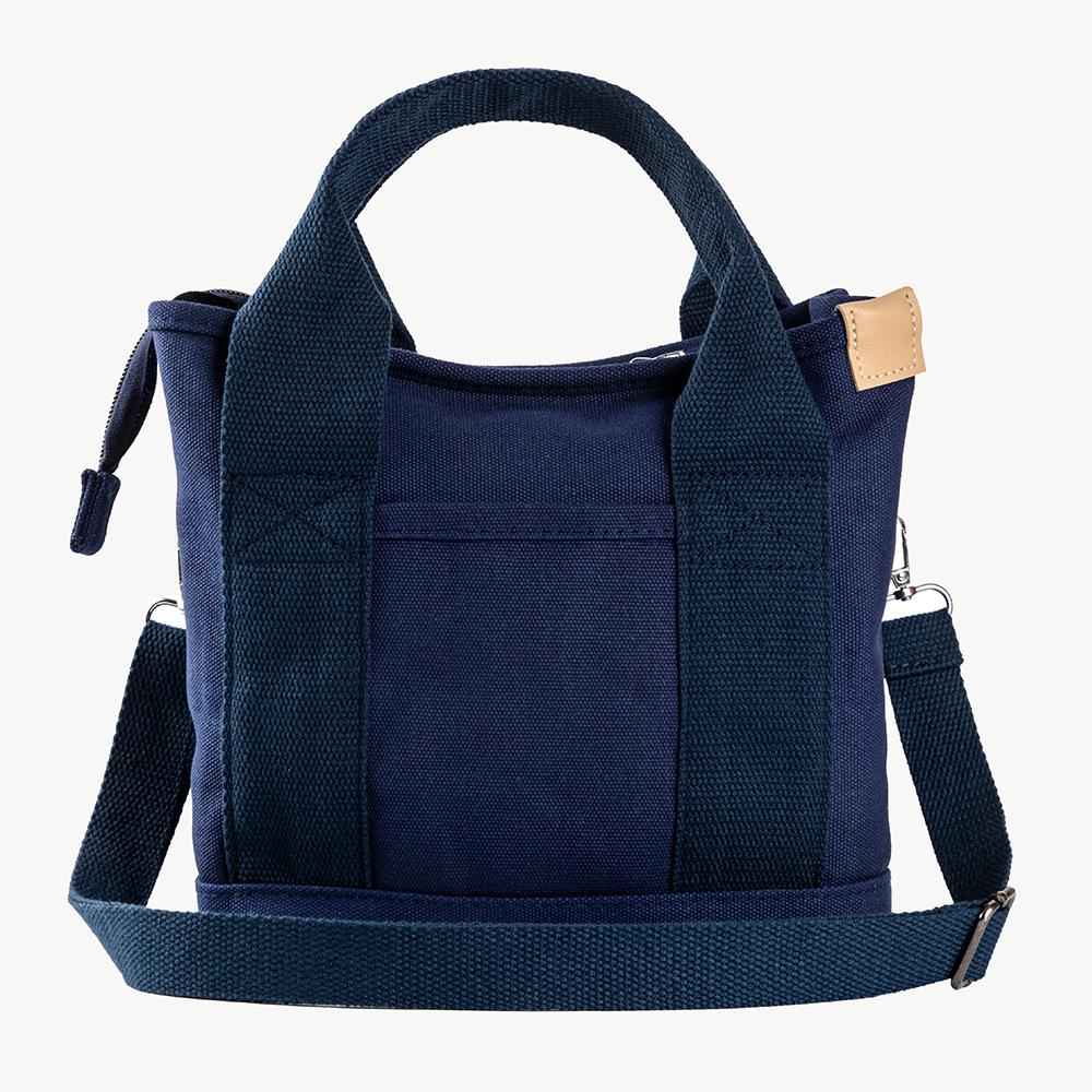 The new Japanese canvas bag is fashionable and simple, large-capacity tote bag, daily commuting multi-purpose bento bag, women s small square bag. синий
The new Japanese canvas bag is fashionable and simple, large-capacity tote bag, daily commuting multi-purpose bento bag, women s small square bag. синий