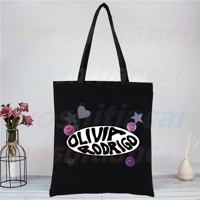 Олівія Родріго Полотняна сумка-тоут Чорні сумки Харадзюку Повсякденна Жіноча Дівчина Тоут Еко-шопер Співачка Sour Сумки через плече 34*42cm
Олівія Родріго Полотняна сумка-тоут Чорні сумки Харадзюку Повсякденна Жіноча Дівчина Тоут Еко-шопер Співачка Sour Сумки через плече 34*42cm