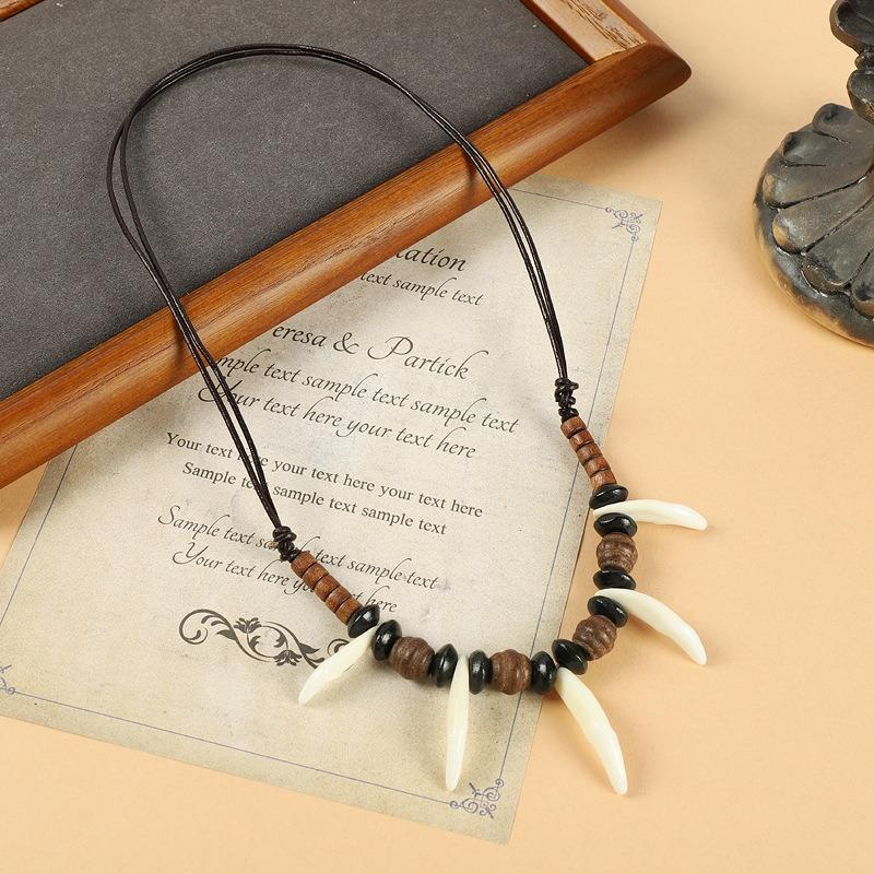 Деревянные бусины ожерелье с настоящим собачьим зубом для мужчин и женщин ретро персонализированный кулон волчий зуб кулон собачий зуб тибетские аксессуары
Деревянные бусины ожерелье с настоящим собачьим зубом для мужчин и женщин ретро персонализированный кулон волчий зуб кулон собачий зуб тибетские аксессуары