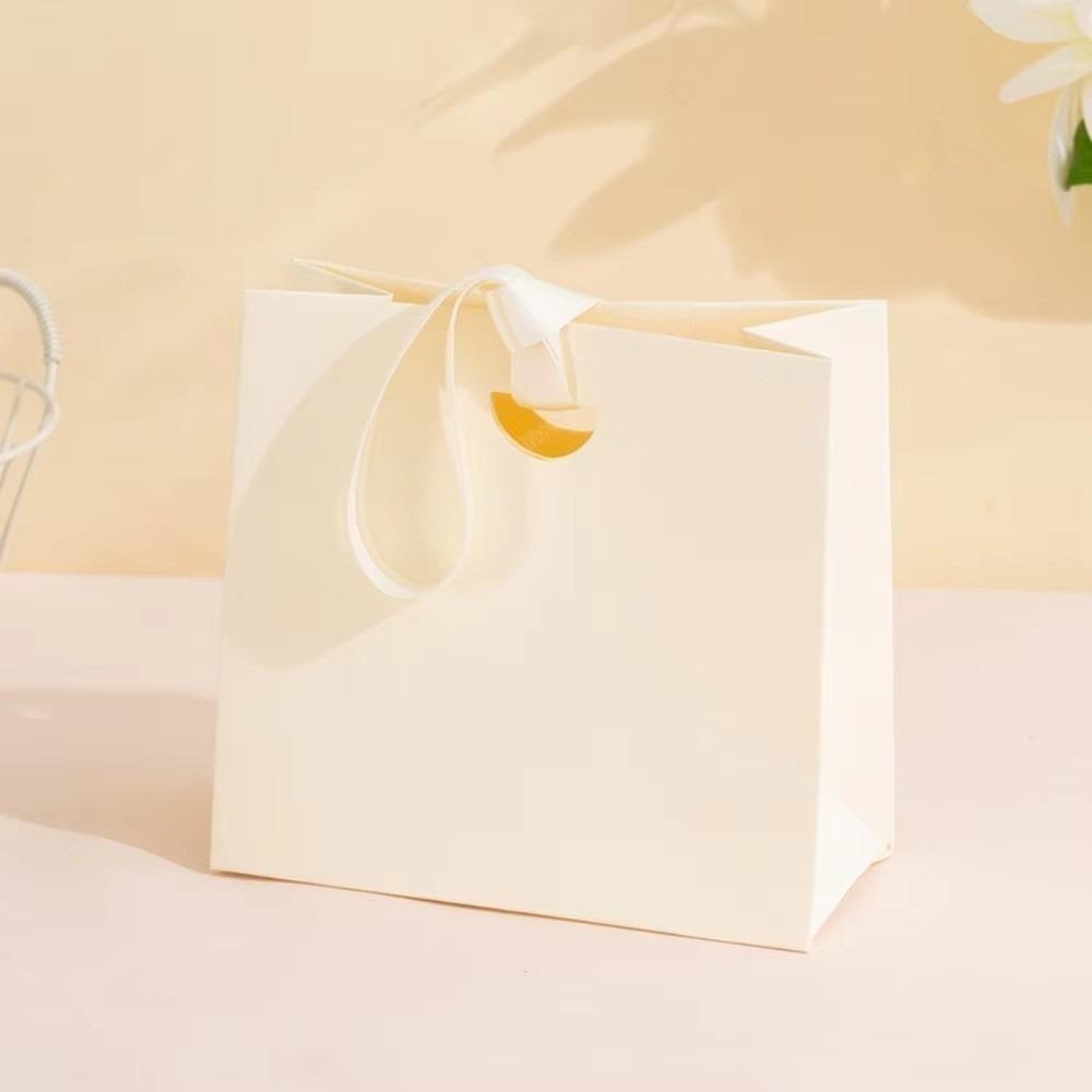 Creative Lightweight Jewellery Packaging Bag Ribbon Handle Gift Wrapping Jewelry Handbag Sustainable Tote Bag
Creative Lightweight Jewellery Packaging Bag Ribbon Handle Gift Wrapping Jewelry Handbag Sustainable Tote Bag