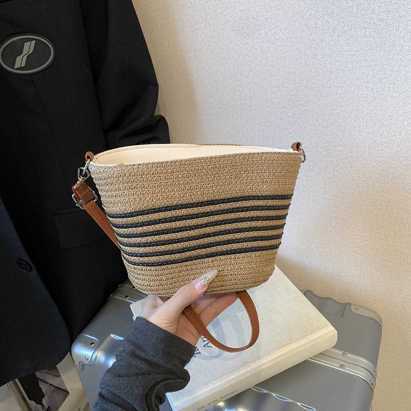 New woven small bag striped messenger straw bag 2025 casual beach bag commuter tote women s bag
New woven small bag striped messenger straw bag 2025 casual beach bag commuter tote women s bag