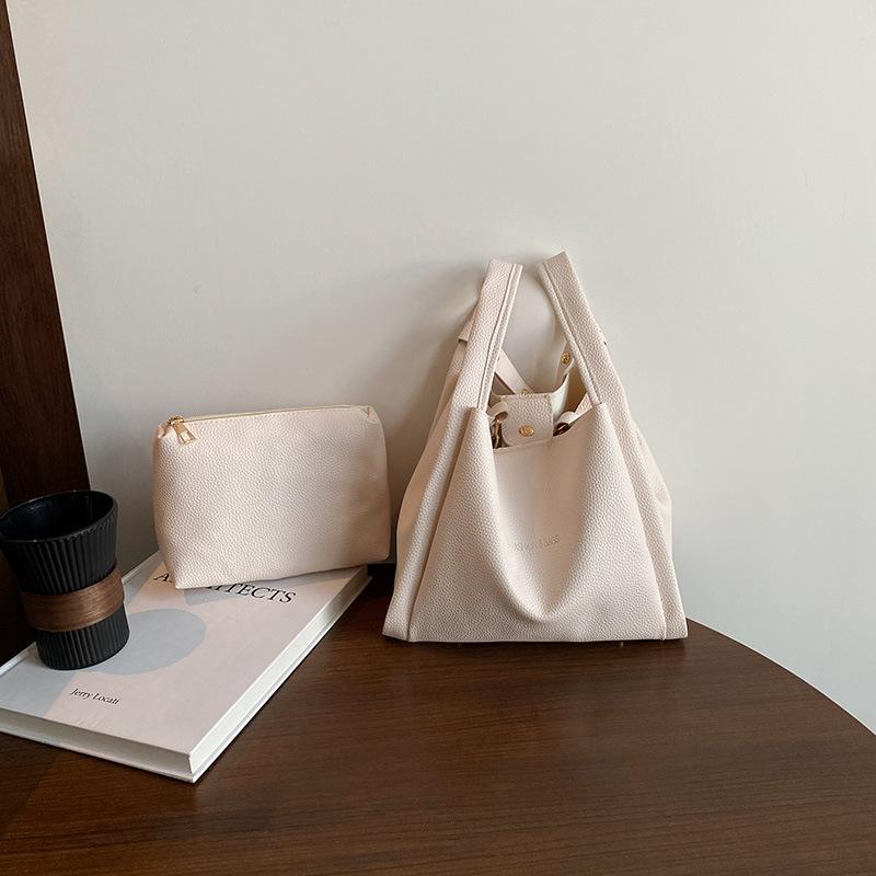 Premium niche new portable solid color casual large capacity mother and child bag crossbody shoulder bucket bag women
Premium niche new portable solid color casual large capacity mother and child bag crossbody shoulder bucket bag women