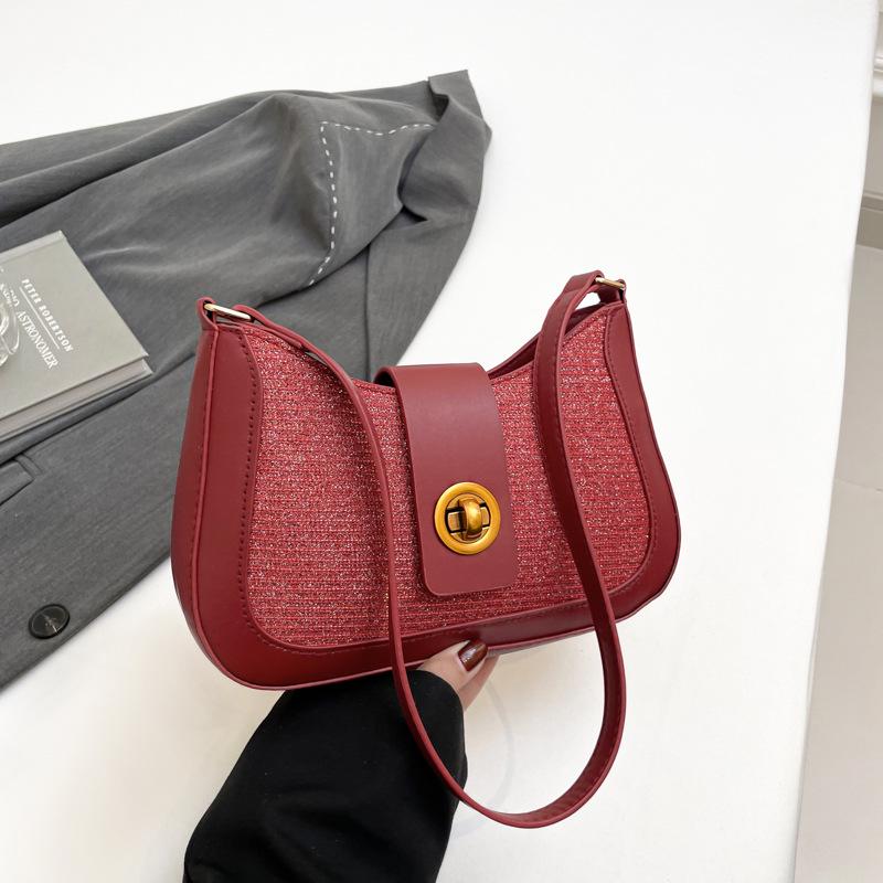 2025 Высококлассная женская сумка-тоут – Стильная, нишевая наплечная сумка с элегантным штрихом красный