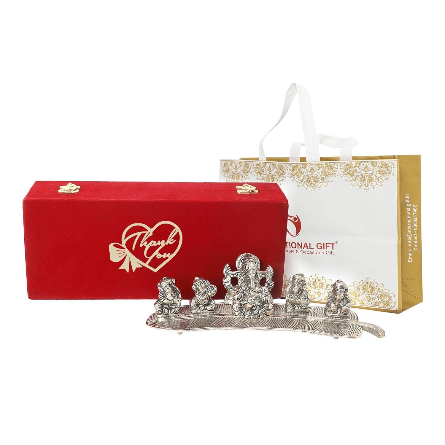 GIFT Silver Musical Ganesh Idol | Thanks Tag with Velvet Box & Carry Bag | Perfect for Expressing Appreciation at Weddings
GIFT Silver Musical Ganesh Idol | Thanks Tag with Velvet Box & Carry Bag | Perfect for Expressing Appreciation at Weddings