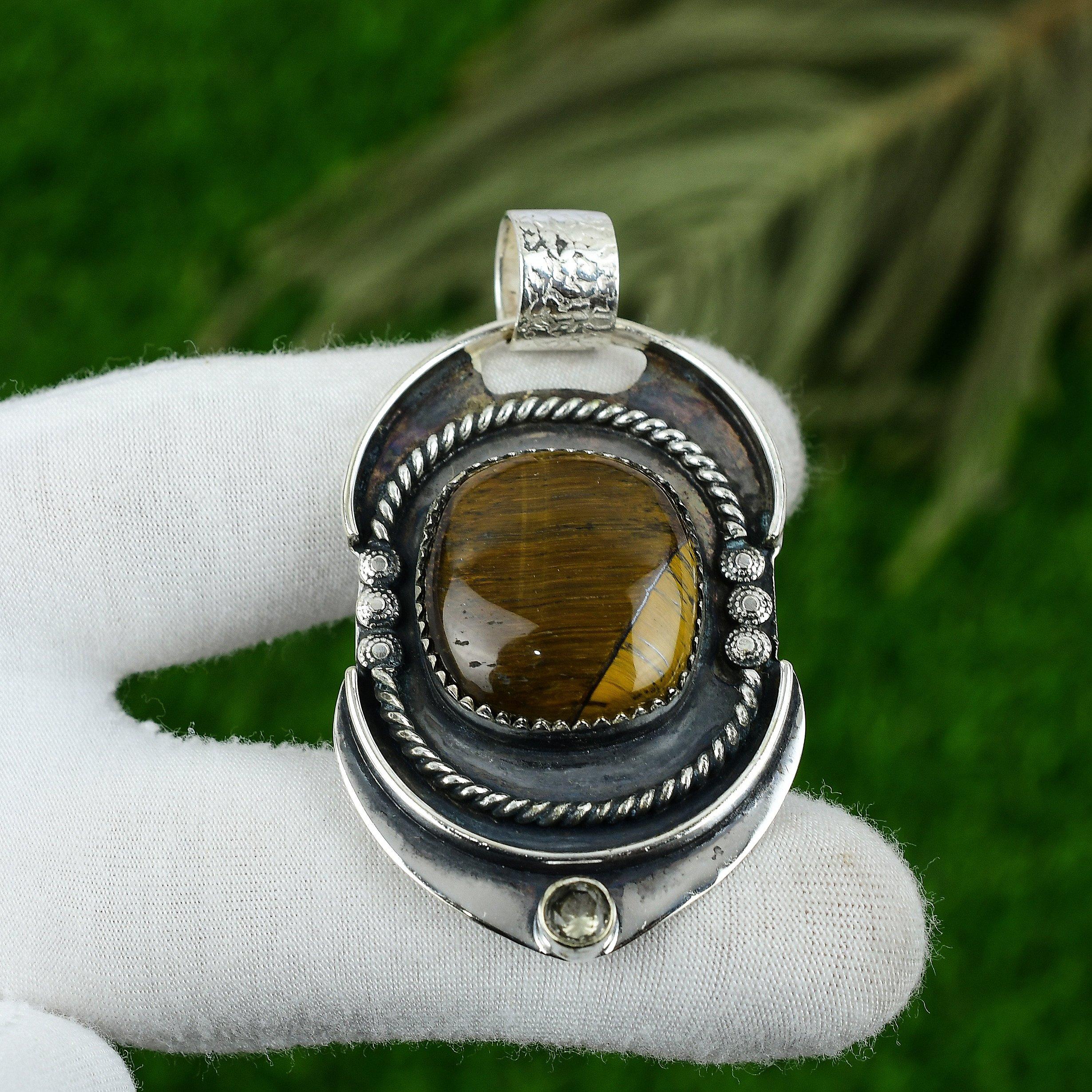 Подвеска из натурального камня Тигровый глаз Ручной работы Серебро 925 пробы Индийские украшения
Подвеска из натурального камня Тигровый глаз Ручной работы Серебро 925 пробы Индийские украшения