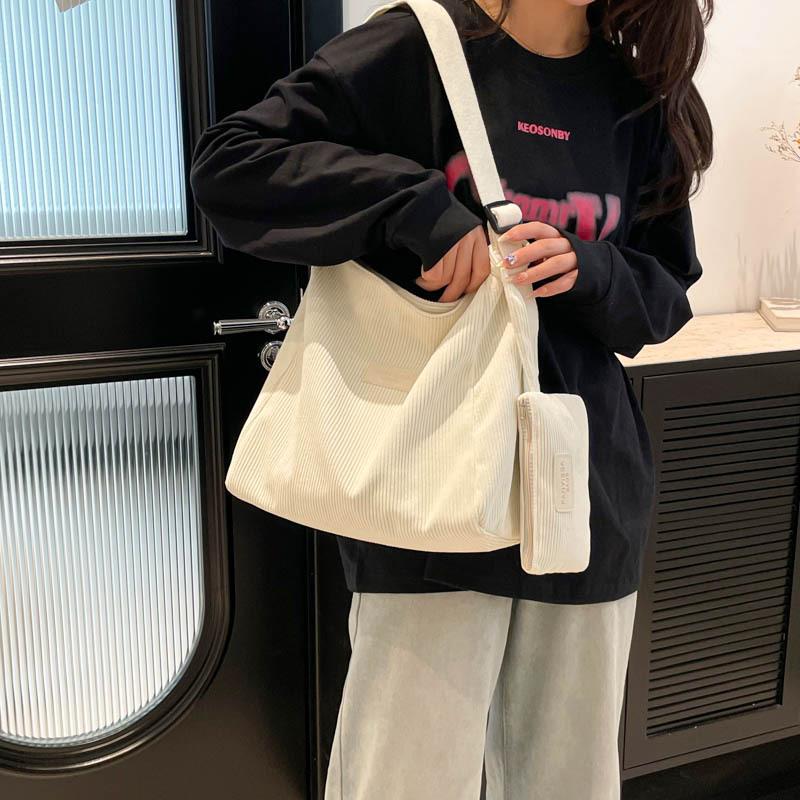 Corduroy large capacity new summer two-piece set casual child and mother tote shoulder messenger bag bag women чорний
Corduroy large capacity new summer two-piece set casual child and mother tote shoulder messenger bag bag women чорний