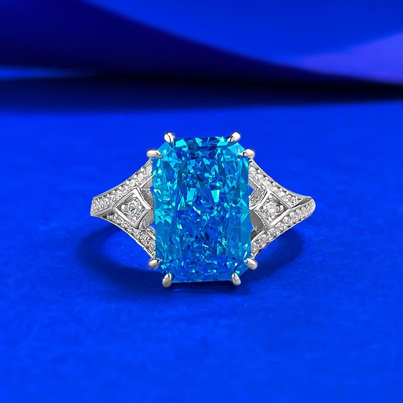Xian Can Jewelry: S925 Silver 8x12mm Sea Blue Ice Flower Cut Ring with High Carbon Diamond Size 6
Xian Can Jewelry: S925 Silver 8x12mm Sea Blue Ice Flower Cut Ring with High Carbon Diamond Size 6
