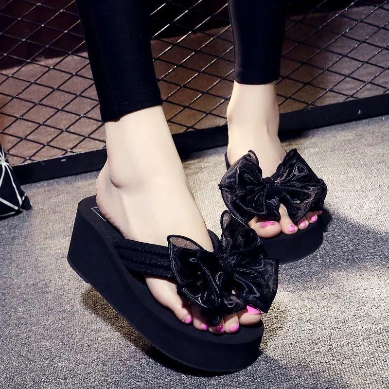 Fashion new bow flip-flops women s summer versatile seaside vacation beach shoes slope heel thick-soled cool slippers outside 40 is one size smaller
Fashion new bow flip-flops women s summer versatile seaside vacation beach shoes slope heel thick-soled cool slippers outside 40 is one size smaller