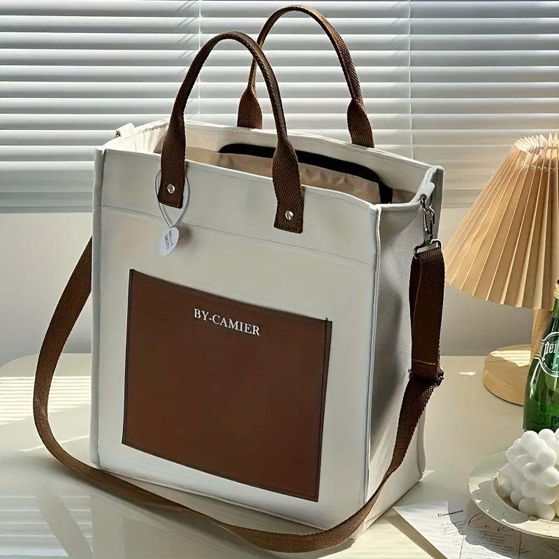 Minimalist Stylish Canvas Tote Bag Large Capacity Outdoor Travel Casual Shoulder Crossbody Bag Fashionable Daily Commute Handbag коричневий
Minimalist Stylish Canvas Tote Bag Large Capacity Outdoor Travel Casual Shoulder Crossbody Bag Fashionable Daily Commute Handbag коричневий