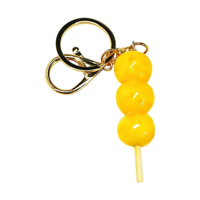 Adorable Fish Ball Siu Mai Shaped Keychain Charm Crafted of Rubber for Keys Bag Decoration and Gift Giving
Adorable Fish Ball Siu Mai Shaped Keychain Charm Crafted of Rubber for Keys Bag Decoration and Gift Giving