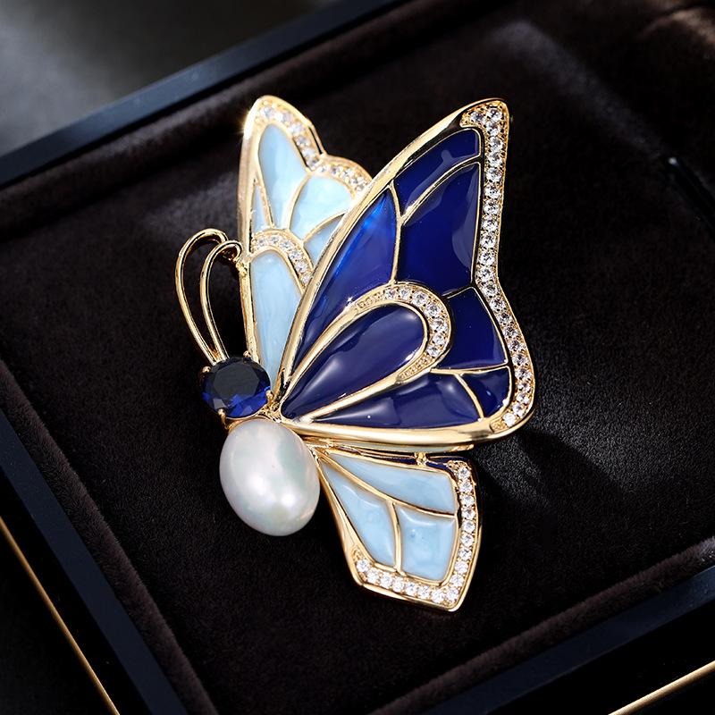 Women s Light Luxury Design Elegant Drop Glaze Micro Inlaid Zircon Butterfly Brooch Fashionable Versatile Niche Design Brooch
Women s Light Luxury Design Elegant Drop Glaze Micro Inlaid Zircon Butterfly Brooch Fashionable Versatile Niche Design Brooch