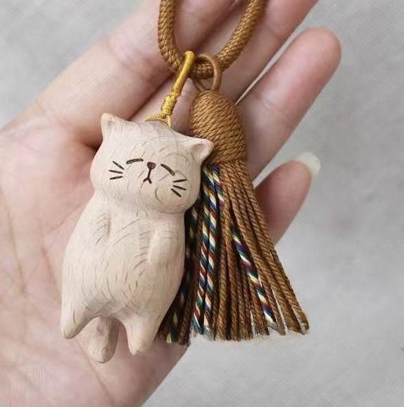 Beech Wood Carved Cute Cat Keychain with Cotton Tassel Ornament
Beech Wood Carved Cute Cat Keychain with Cotton Tassel Ornament