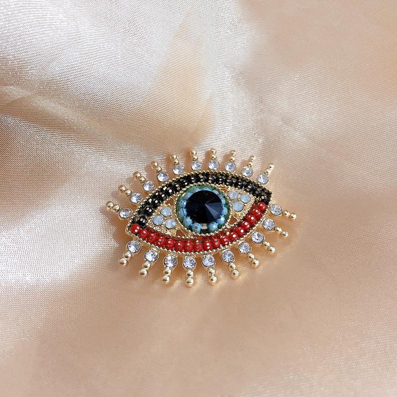 European & American Eye Rhinestone Brooch with Drip Oil Finish - Stylish Fashion Accessory
European & American Eye Rhinestone Brooch with Drip Oil Finish - Stylish Fashion Accessory