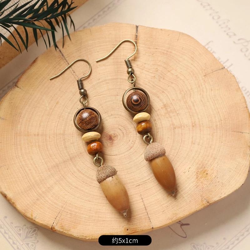 Винтажный лесной стиль, натуральные растительные аксессуары для ушей, ручная работа, креативные, маленькие и уникальные серьги в виде плодов дуба, длинные серьги с кисточками
Винтажный лесной стиль, натуральные растительные аксессуары для ушей, ручная работа, креативные, маленькие и уникальные серьги в виде плодов дуба, длинные серьги с кисточками