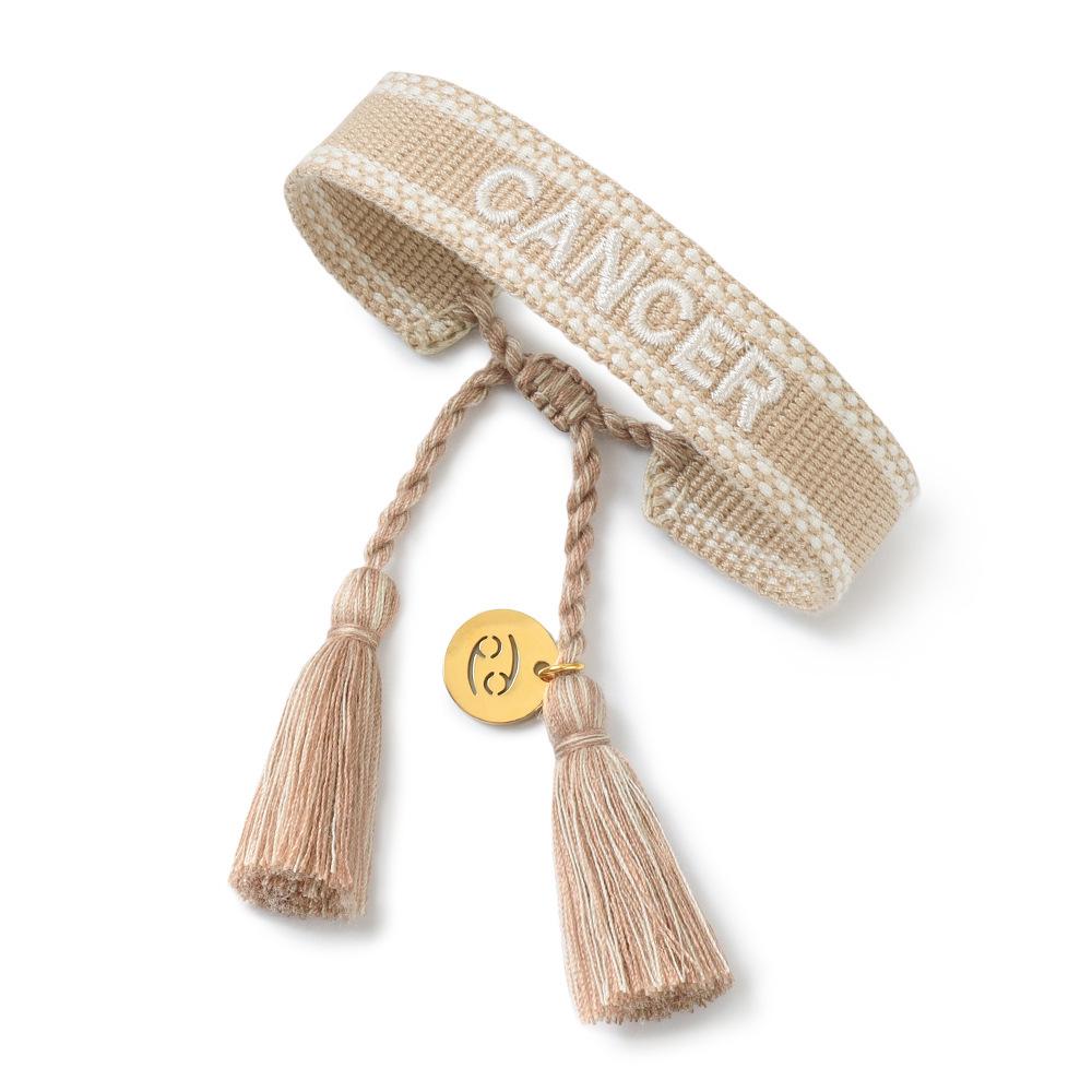 Cross Twelve Constellation Bracelet: Personalized Handmade Woven Rope with Embroidered Letters and Constellation Pendant.
Cross Twelve Constellation Bracelet: Personalized Handmade Woven Rope with Embroidered Letters and Constellation Pendant.