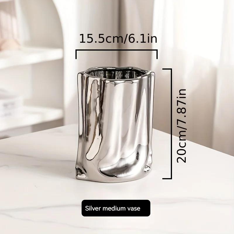 Роскошная и элегантная креативная керамическая ваза с гальваническим покрытием под серебро, с высококлассным ощущением, подходящая для демонстрации искусственных цветов
Роскошная и элегантная креативная керамическая ваза с гальваническим покрытием под серебро, с высококлассным ощущением, подходящая для демонстрации искусственных цветов