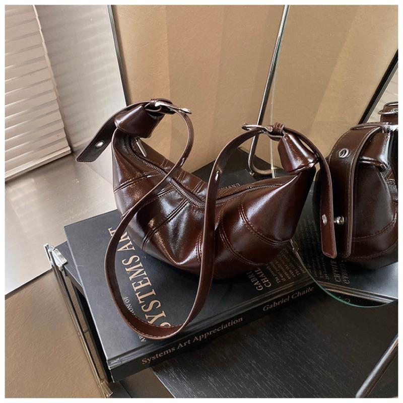 Trend croissant bag niche spring new dumpling bag simple fashion retro shoulder messenger bag women темно-коричневого кольору
Trend croissant bag niche spring new dumpling bag simple fashion retro shoulder messenger bag women темно-коричневого кольору