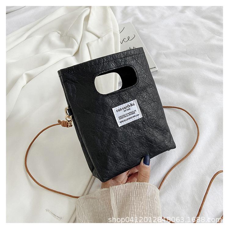 Fashion portable paper bag bag 2025 new high-end niche messenger bag large capacity chain hand carry tote bag tide чёрный
Fashion portable paper bag bag 2025 new high-end niche messenger bag large capacity chain hand carry tote bag tide чёрный