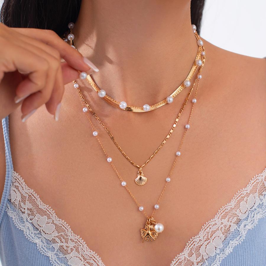 Pearl starfish shell pendant multi-layer necklace temperament collarbone chain personality high-end niche jewelry
Pearl starfish shell pendant multi-layer necklace temperament collarbone chain personality high-end niche jewelry