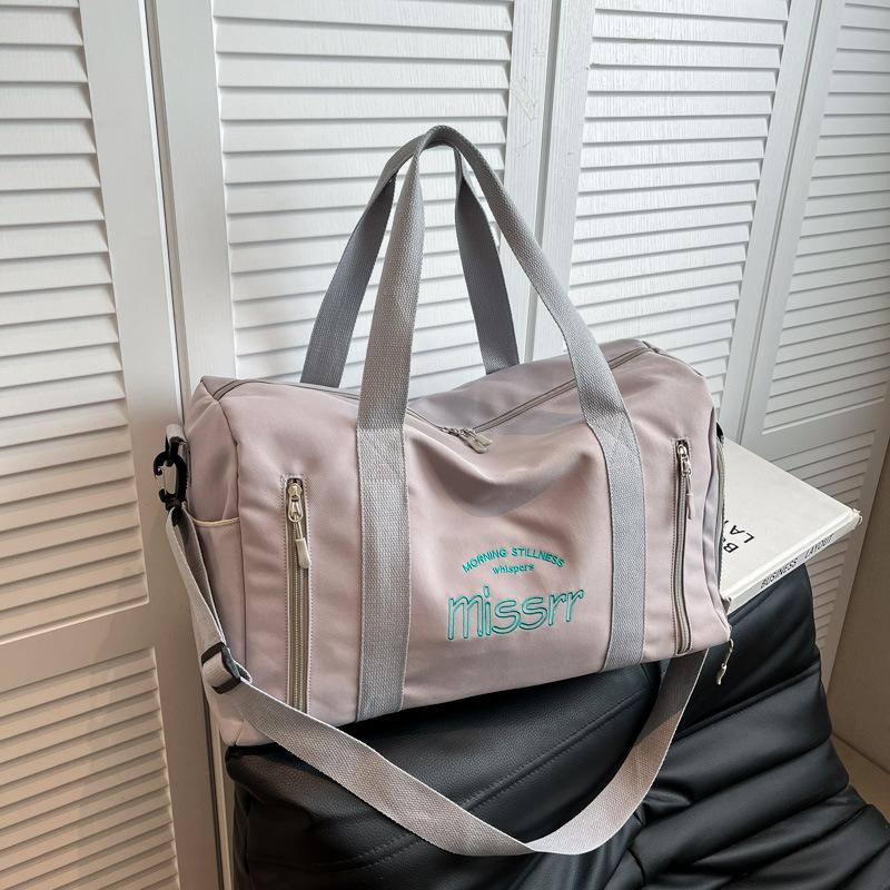 Large-capacity portable short-trip travel bag, luggage bag for women, fashionable and lightweight gym yoga bag, swimming and travel storage bag сірий колір
Large-capacity portable short-trip travel bag, luggage bag for women, fashionable and lightweight gym yoga bag, swimming and travel storage bag сірий колір