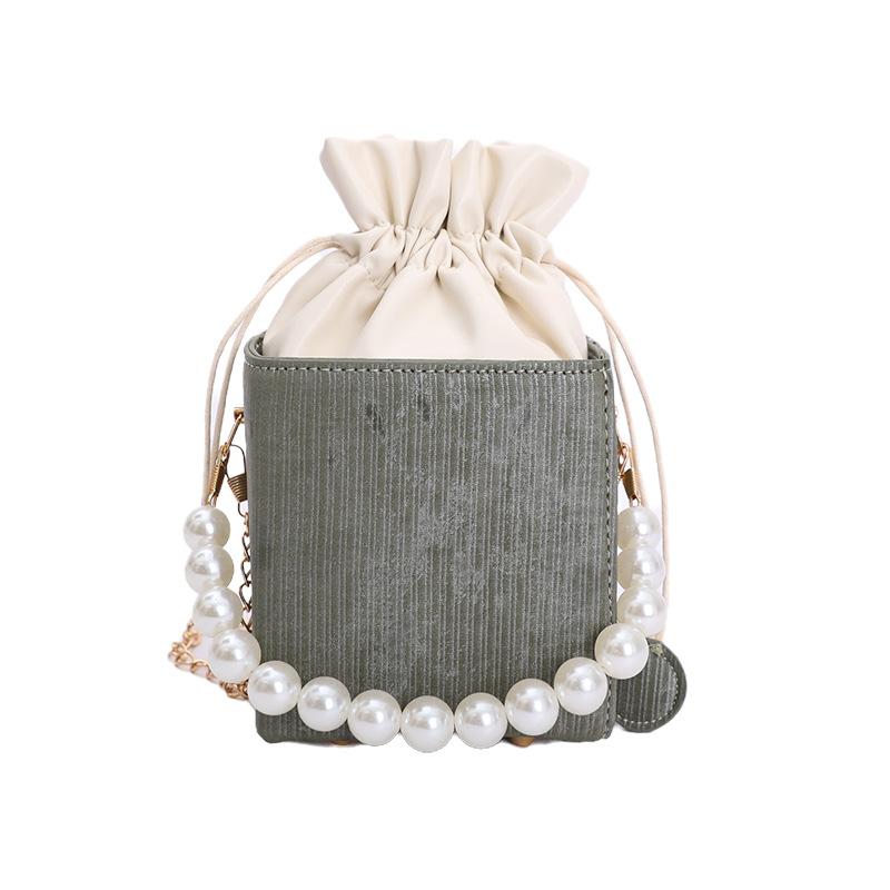 Hand carry pearl bucket bag women s new autumn simple fashion shoulder bag niche texture messenger bag зелений
Hand carry pearl bucket bag women s new autumn simple fashion shoulder bag niche texture messenger bag зелений