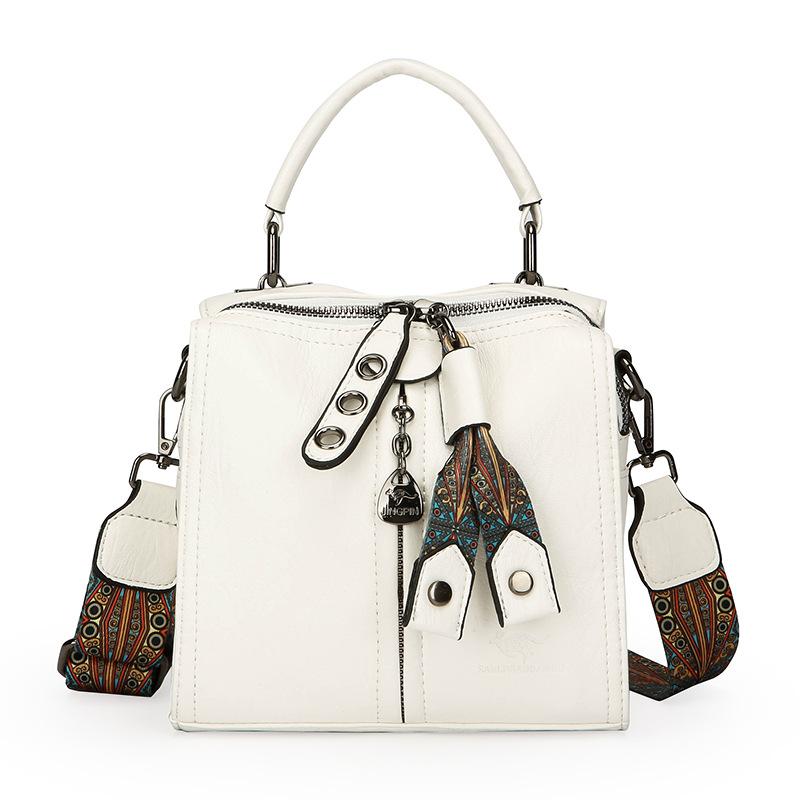 Это высококлассная женская сумочка, одноплечная сумка для поездок на работу и многослойная сумка кроссбоди большой вместимости. белый