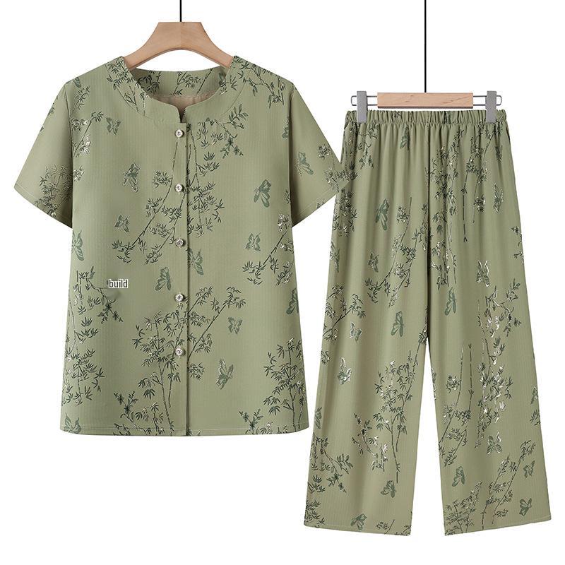Printed Summer Two-Piece Set for Mature Women: Loose Short-Sleeved Top and Wide-Leg Pants, Comfortable Plus Size Home Wear 5XL (suggested 75-80 kg) зелёный
Printed Summer Two-Piece Set for Mature Women: Loose Short-Sleeved Top and Wide-Leg Pants, Comfortable Plus Size Home Wear 5XL (suggested 75-80 kg) зелёный