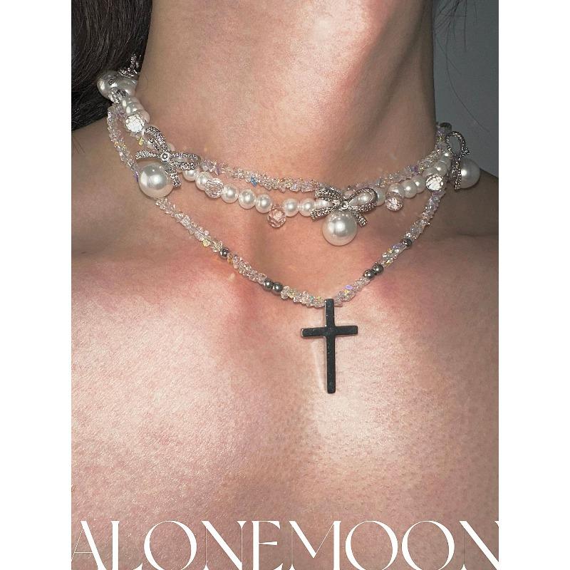 Ожерелье-чокер с жемчужным крестом
Ожерелье-чокер с жемчужным крестом
