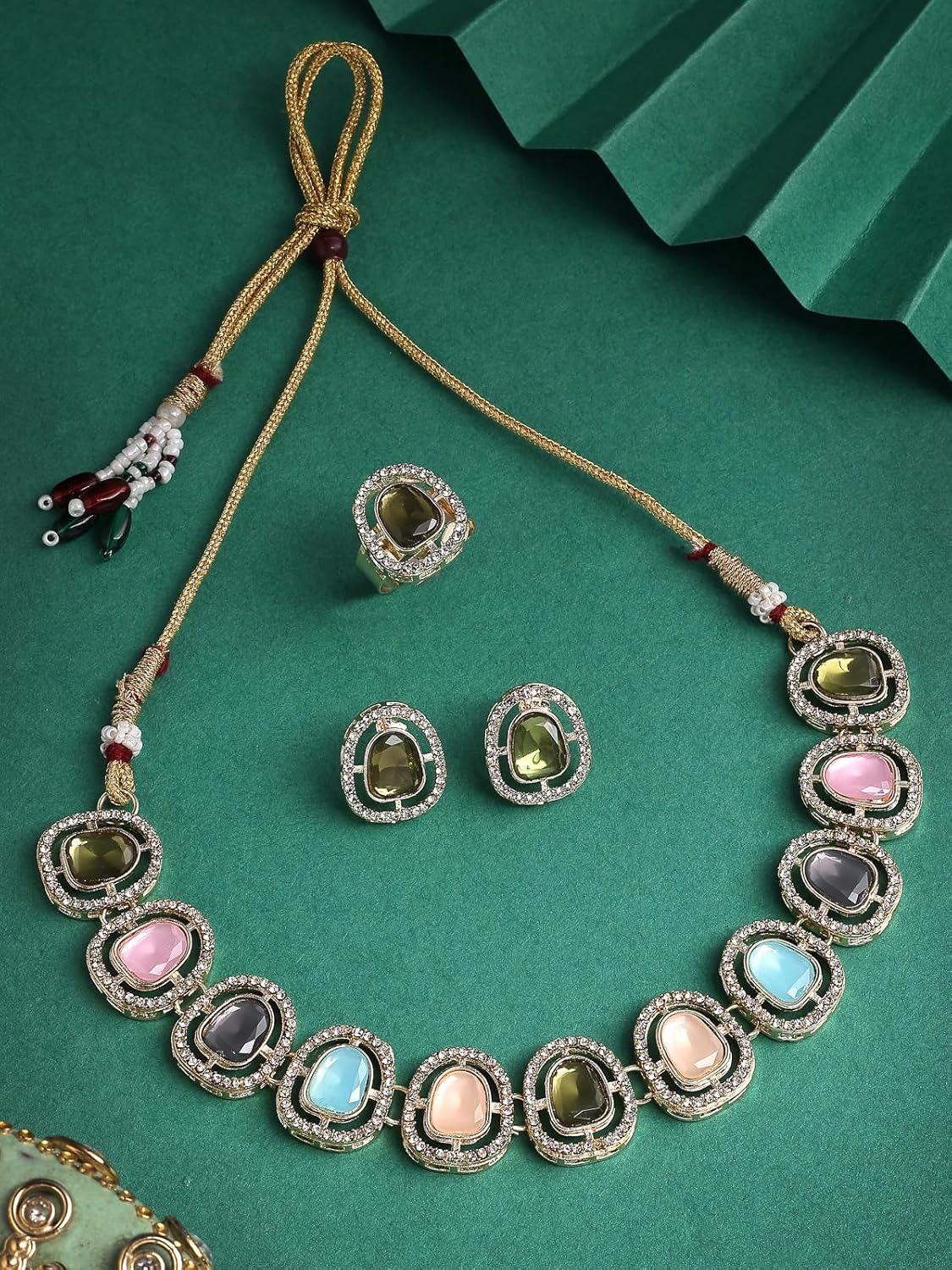 Iconic Gold Plated AD Stones Studded Multicolor Choker Necklace Set with Studs Earrings & Ring Jewellery for Women Oneisze
Iconic Gold Plated AD Stones Studded Multicolor Choker Necklace Set with Studs Earrings & Ring Jewellery for Women Oneisze