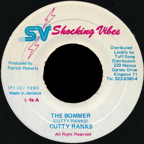 7inch Record CUTTY RANKS - The Bommer NONE Shocking Vibes 1990 Jamaica Reggae, Ska & Dub Used
7inch Record CUTTY RANKS - The Bommer NONE Shocking Vibes 1990 Jamaica Reggae, Ska & Dub Used